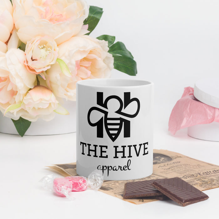 The Hive Apparel white glossy mug with black text